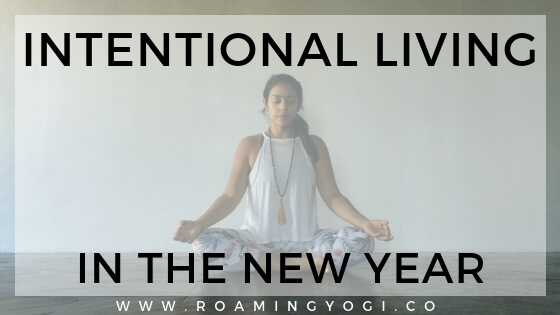 Image of seated meditation pose with text overlay: Intentional Living in the New Year