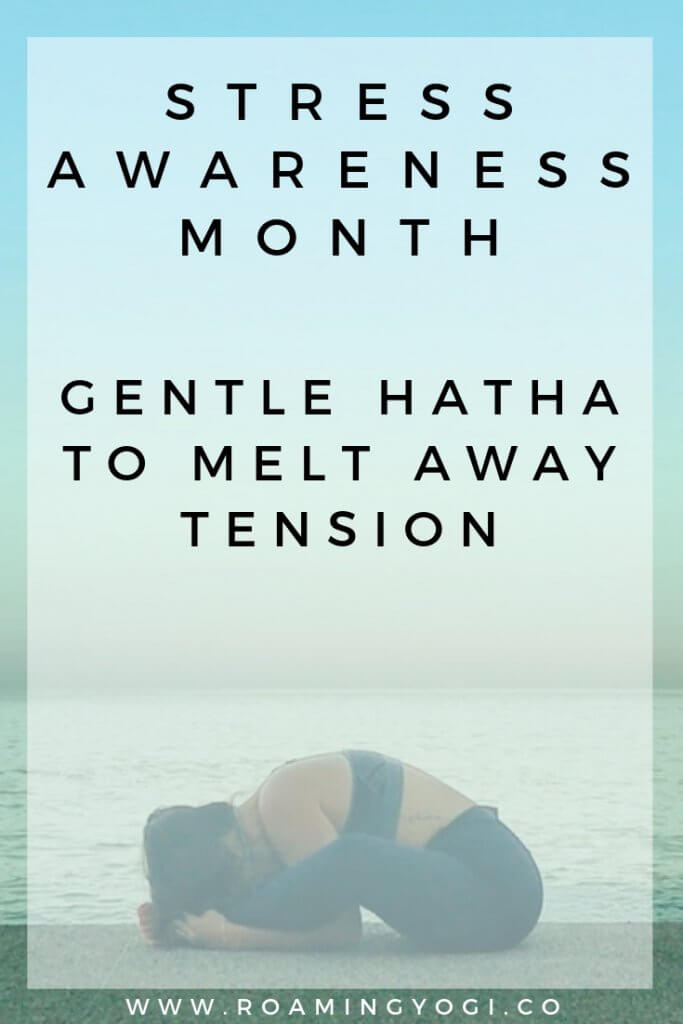 Image of a young woman in the seated yoga pose Baddha Konasana, with her head resting on her feet, with text overlay: Stress Awareness Month. Gentle Hatha to Melt Away Tension. www.roamingyogi.co